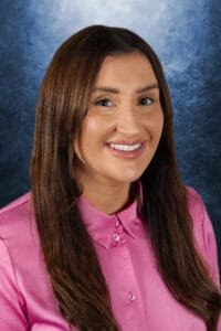 Portrait image of a lady in pink photography faqs