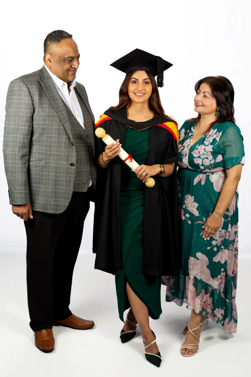 Event photography of a graduate with a family
